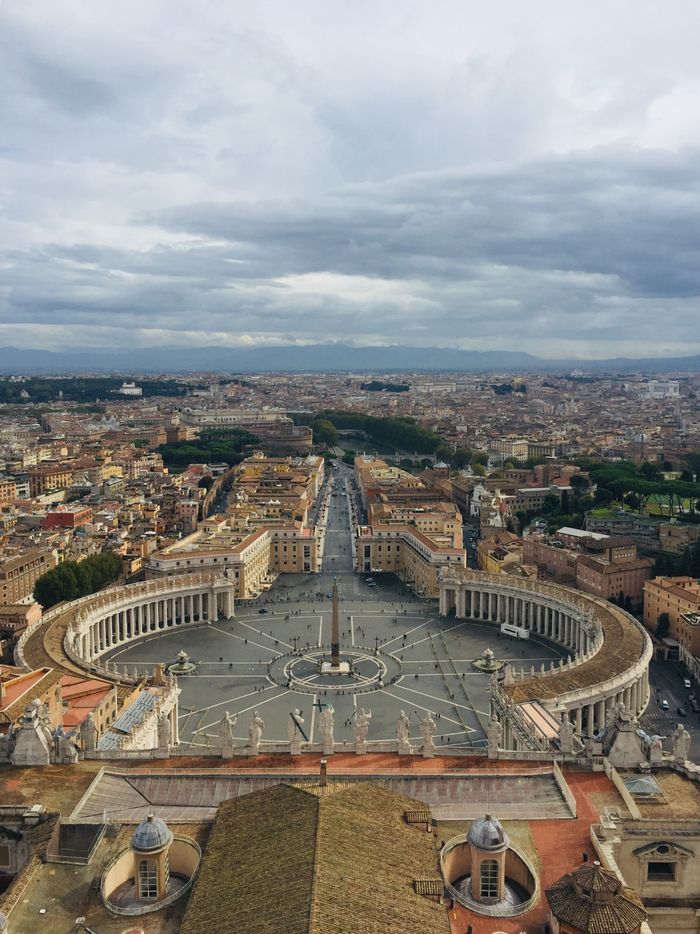 A stunning aerial view of St. Peter's Square in Vatican City, capturing its iconic architecture.